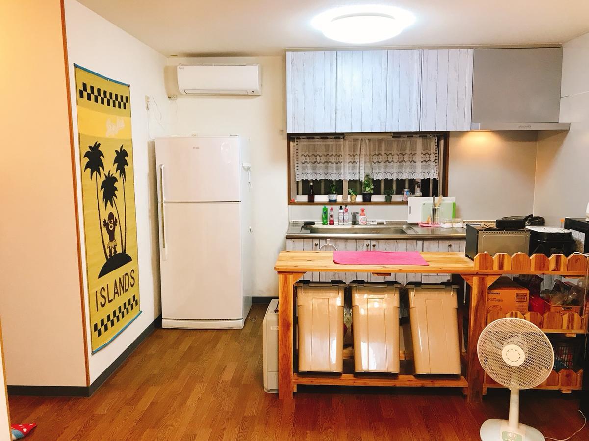 Guest House Waraemon Nago Exterior foto