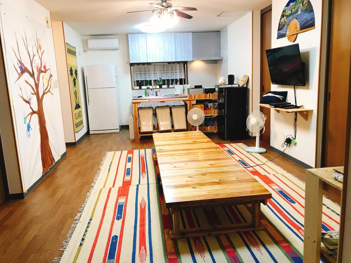 Guest House Waraemon Nago Exterior foto