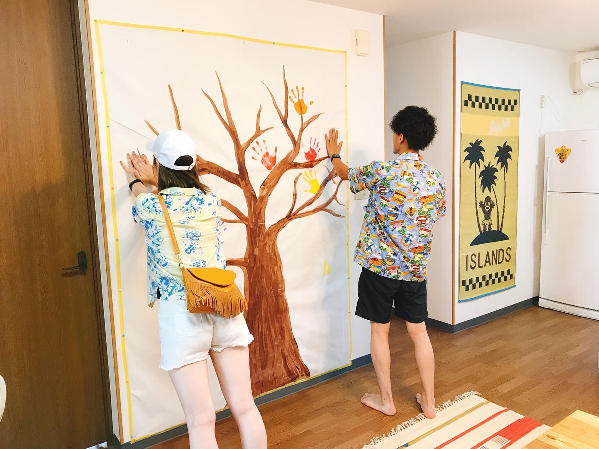 Guest House Waraemon Nago Exterior foto